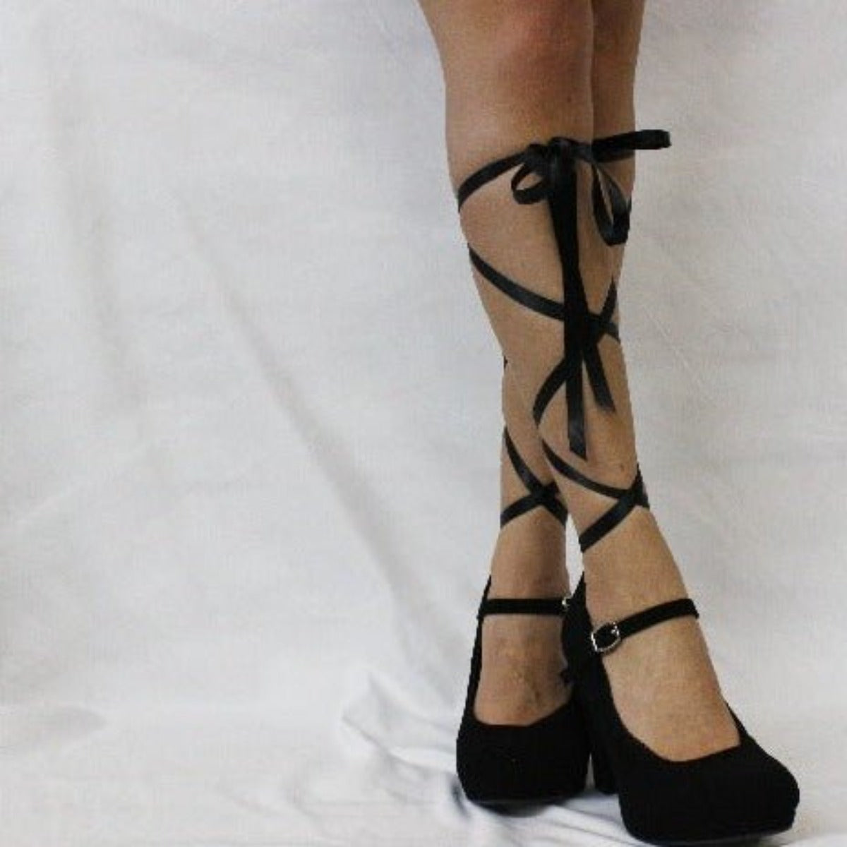 http://www.catherinecole.com/cdn/shop/products/Ballerina-sock-lace-up-ties_45bbab45-34af-4a6c-8f08-aaf9e252d1df-374573.jpg?v=1700221432